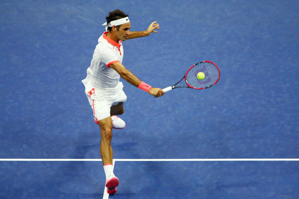 NEW YORK, NY - SEPTEMBER 03:  Roger Federer of Switzerland returns a shot to  Steve Darcis of Belgium during their Men's Singles Second Round match on Day Four of the 2015 US Open at the USTA Billie Jean King National Tennis Center on September 3, 2015 in the Flushing neighborhood of the Queens borough of New York City.  (Photo by Clive Brunskill/Getty Images)