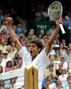 Croatian player Mario Ancic celebrates after his f