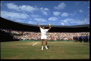 7 JUL 1991:  MICHAEL STICH OF GERMANY HOLDS THE MEN's SINGLES TROPHY UP TO THE CROWD AT THE 1991 WIMBLEDON CHAMPIONSHIPS.