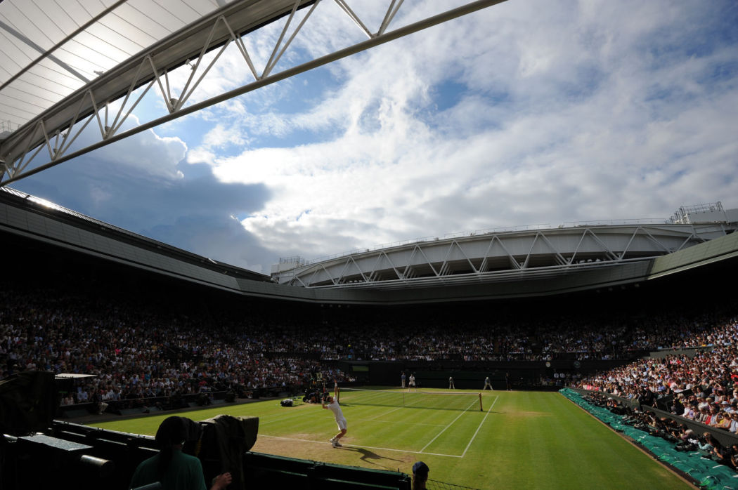 Britain’s Andy Murray serves during his