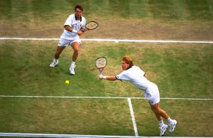 Todd Woodbridge and double partner Mark Woodforde of Australia in action