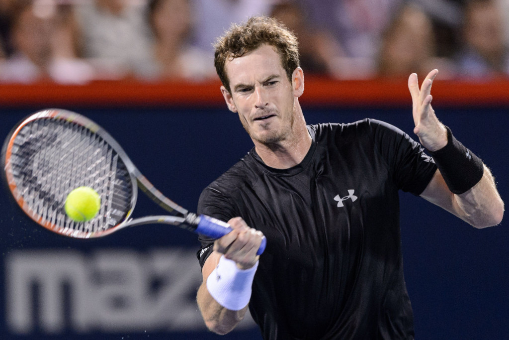 MONTREAL, ON - AUGUST 15:  Andy Murray of Great Britain returns a hit against Kei Nishikori of Japan during day six of the Rogers Cup at Uniprix Stadium on August 15, 2015 in Montreal, Quebec, Canada.  (Photo by Minas Panagiotakis/Getty Images)