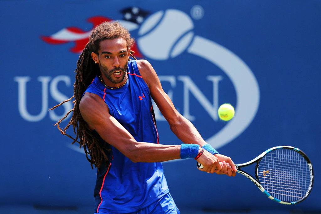 NEW YORK, NY - SEPTEMBER 01:  Dustin Brown of Germany returns a shot to Robin Haase of Netherlands during their Men's Singles First Round match on Day Two of the 2015 US Open at the USTA Billie Jean King National Tennis Center on September 1, 2015 in the Flushing neighborhood of the Queens borough of New York City.  (Photo by Elsa/Getty Images)