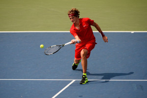 NEW YORK, NY - SEPTEMBER 01:  Alexander Zverev of Germany returns a shot against Philipp Kohlschreiber of Germany during their Men's Singles First Round match on Day Two of the 2015 US Open at the USTA Billie Jean King National Tennis Center on September 1, 2015 in the Flushing neighborhood of the Queens borough of New York City.  (Photo by Alex Goodlett/Getty Images)