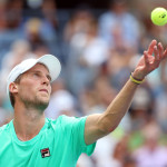 NEW YORK, NY - SEPTEMBER 04:  Andreas Seppi of Italy serves to Novak Djokovic of Serbia during their Men's Singles Third Round match on Day Five of the 2015 US Open at the USTA Billie Jean King National Tennis Center on September 4, 2015 in the Flushing neighborhood of the Queens borough of New York City.  (Photo by Streeter Lecka/Getty Images)