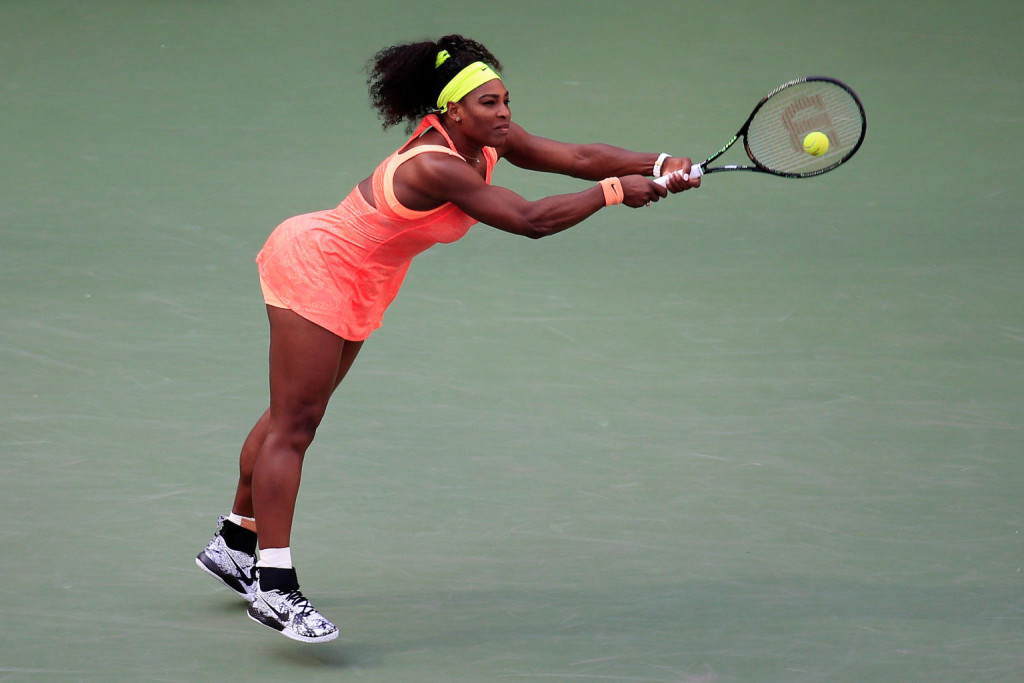 NEW YORK, NY - SEPTEMBER 06:  Serena Williams of the United States returns a shot to Madison Keys of the United States during their Women's Singles Fourth Round match on Day Seven of the 2015 U.S. Open at the USTA Billie Jean King National Tennis Center on September 6, 2015 in the Flushing neighborhood of the Queens borough of New York City.  (Photo by Chris Trotman/Getty Images for the USTA)