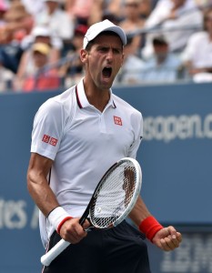 Novak Djokovic of Serbia celebrates a point against Kei Nishikori of Japan during their 2014 US Open men's semifinal singles match at the USTA Billie Jean King National Tennis Center September 6, 2014 in New York. AFP PHOTO/Stan HONDA (Photo credit should read STAN HONDA/AFP/Getty Images)