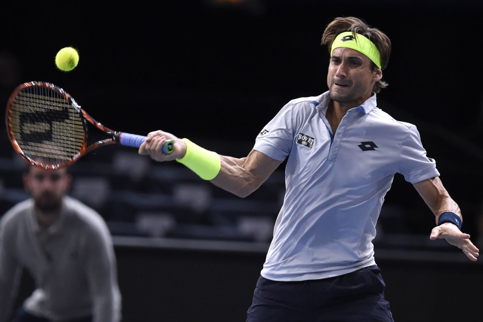Spain's David Ferrer returns the ball to Ukraine's Alexandr Dolgopolov during their first round tennis match at the ATP World Tour Masters 1000 indoor tennis tournament in Paris on November 3, 2015. AFP PHOTO / MIGUEL MEDINA        (Photo credit should read MIGUEL MEDINA/AFP/Getty Images)