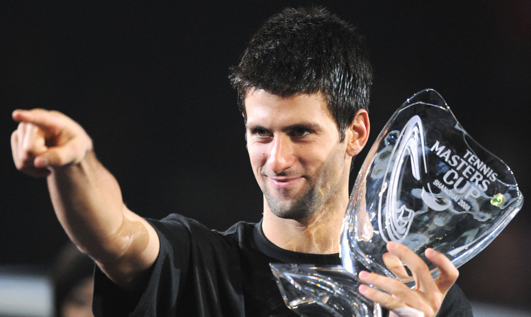 Novak Djokovic of Serbia points to his g