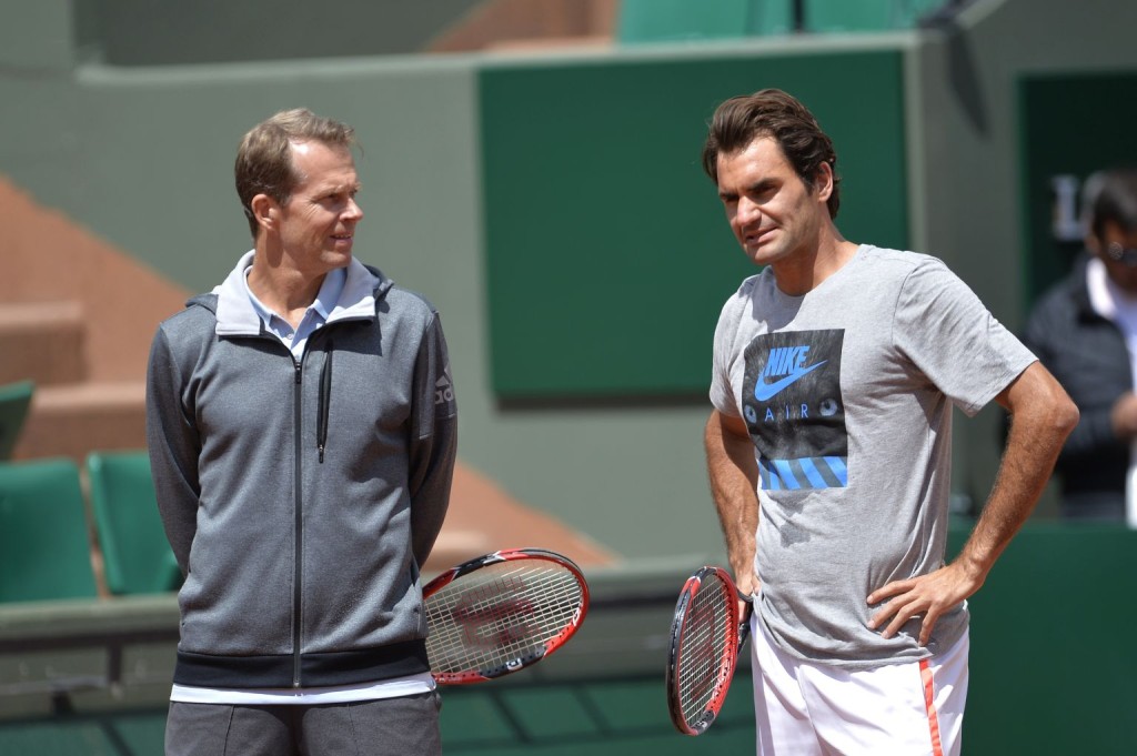 Swiss Roger Federer (L) and his Swedish coach Stefan Edberg attend a training session prior the 2015 French Open Tennis championships at the Roland Garros stadium in Paris on May 21, 2015. AFP PHOTO / MIGUEL MEDINA        (Photo credit should read MIGUEL MEDINA/AFP/Getty Images)