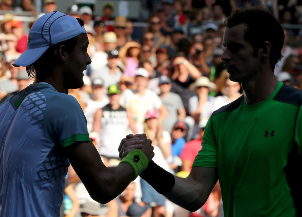 MELBOURNE, AUSTRALIA - JANUARY 23:  Andy Murray of Great Britain and and Joao Sousa of Portugal at the net in their third round match against during day five of the 2015 Australian Open at Melbourne Park on January 23, 2015 in Melbourne, Australia.  (Photo by Wayne Taylor/Getty Images)