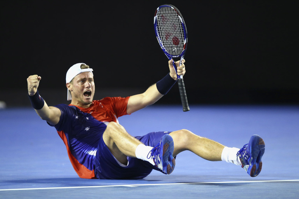 XXX of ZZZ plays a forehand in his/her first round match against XXXX of ZZZZ during day two of the 2016 Australian Open at Melbourne Park on January 19, 2016 in Melbourne, Australia.