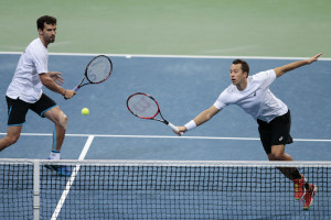 HANOVER, GERMANY - MARCH 05:  Philipp Petzschner and Philipp Kohlschreiber of Germany in action against Tomas Berdych and Radek Stepanek of Czech Republic in their doubles match during day two of the Davis Cup World Group first round between Germany and Czech Republic at TUI Arena on March 5, 2016 in Hanover, Germany.  (Photo by Oliver Hardt/Bongarts/Getty Images)