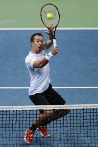 HANOVER, GERMANY - MARCH 05:  Philipp Kohlschreiber of Germany in action against Tomas Berdych and Radek Stepanek of Czech Republic in their doubles match during day two of the Davis Cup World Group first round between Germany and Czech Republic at TUI Arena on March 5, 2016 in Hanover, Germany.  (Photo by Oliver Hardt/Bongarts/Getty Images)