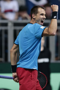 HANOVER, GERMANY - MARCH 06:  Lukas Rosol of Czech Republic celebrates after scoring in his match against Alexander Zverev of Germany during Day 3 of the Davis Cup World Group first round between Germany and Czech Republic on March 6, 2016 in Hanover, Germany.  (Photo by Oliver Hardt/Bongarts/Getty Images)