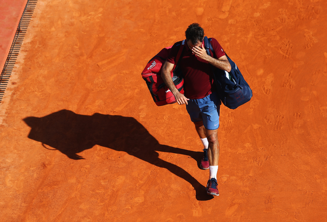 MONTE-CARLO, MONACO - APRIL 15:  Roger Federer of Switzerland reacts after defeat in the quarter final match against Jo-Wilfried Tsonga of France on day six of the Monte Carlo Rolex Masters at Monte-Carlo Sporting Club on April 15, 2016 in Monte-Carlo, Monaco.  (Photo by Michael Steele/Getty Images)