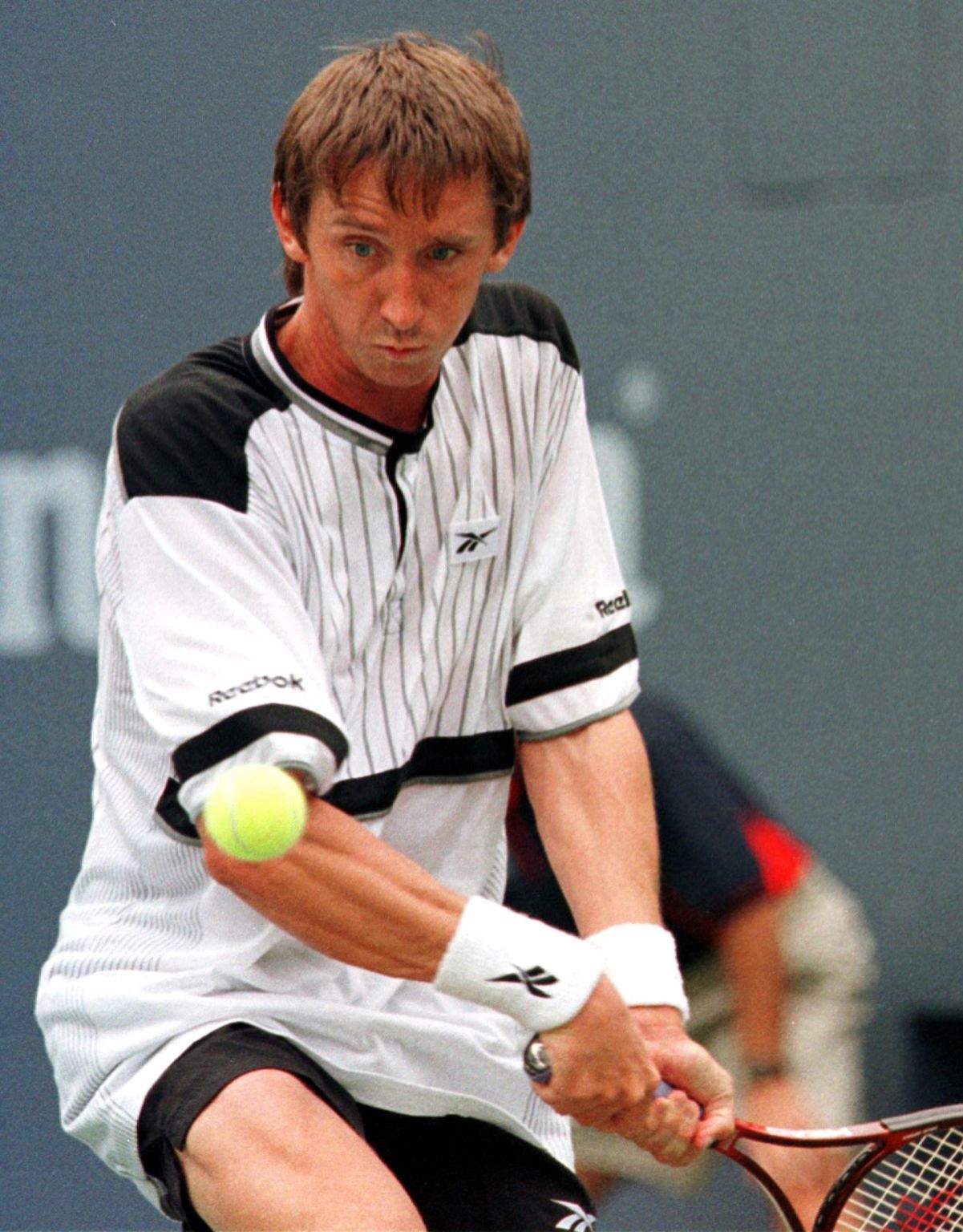 Germany's Bernd Karbacher returns a backhand to th tennis MAGAZIN