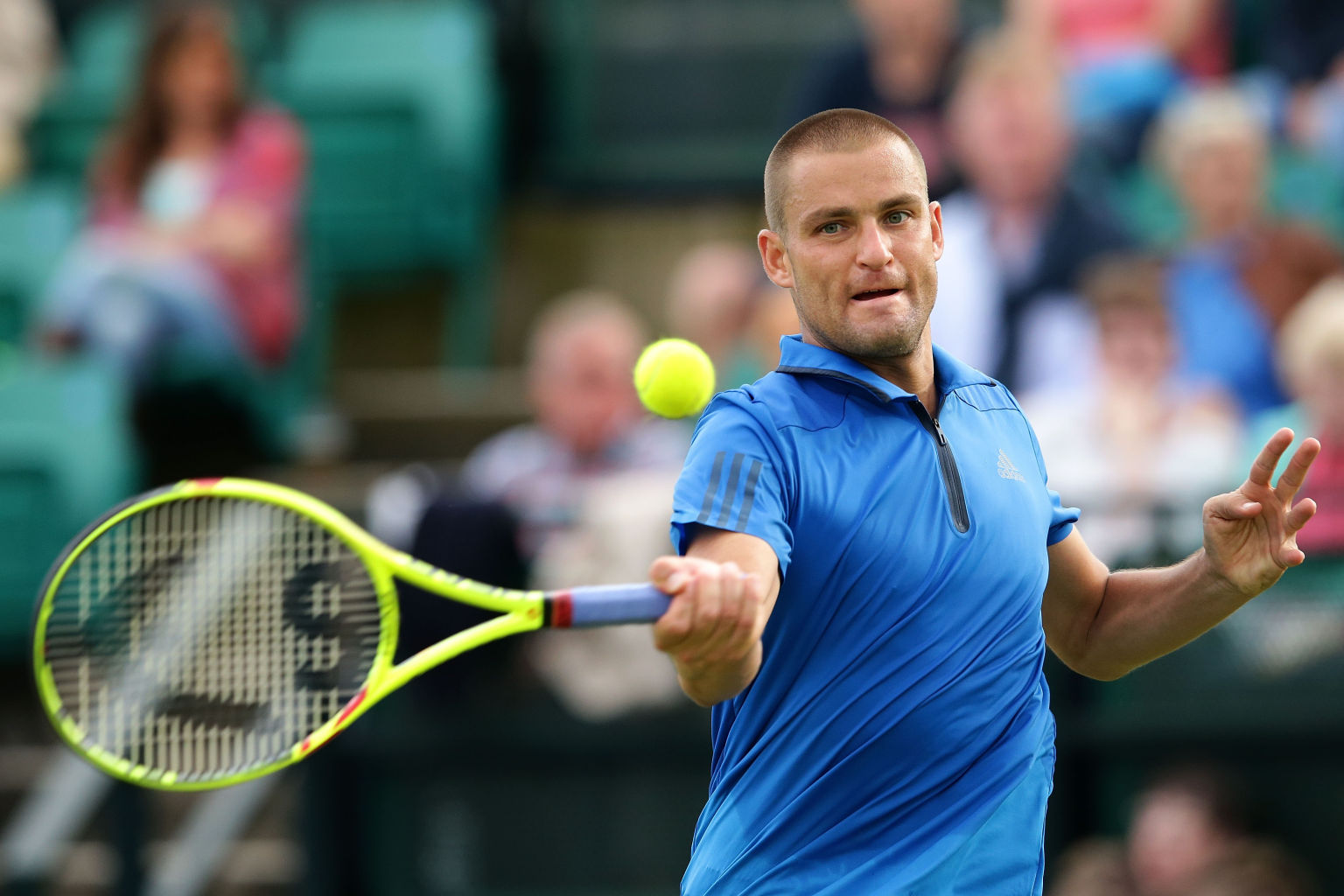 NOTTINGHAM, ENGLAND - JUNE 22:  Mikhail Youzhny of Russia plays a forehand during his men's singles match against Gilles Muller of Luxembourg during day three of the ATP Aegon Open Nottingham at Nottingham Tennis Centre on June 22, 2016 in Nottingham, England.  (Photo by Daniel Smith/Getty Images)