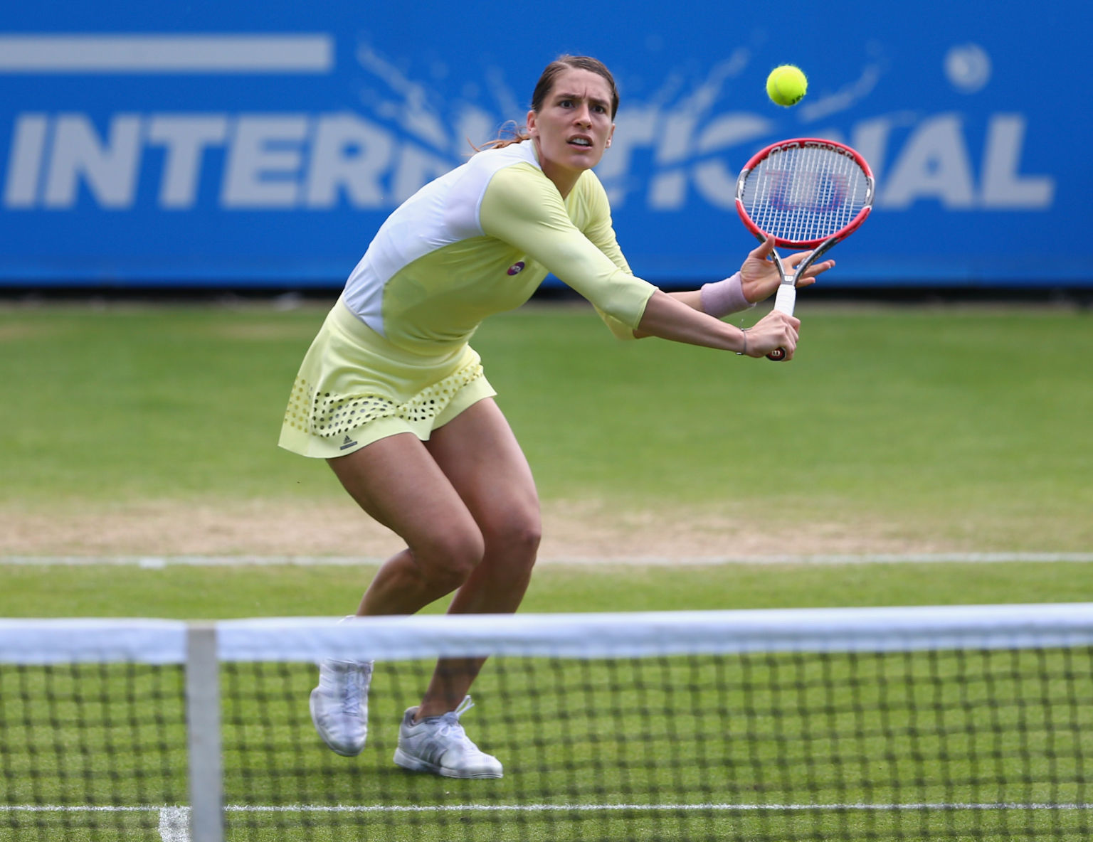 EASTBOURNE, ENGLAND - JUNE 23: Andrea Petkovic of Germany plays a forehand during her third round women's singles match against Ekaterina Makarova of Russia on day five of the WTA Aegon International at Devonshire Park on June 23, 2016 in Eastbourne, England. (Photo by Steve Bardens/Getty Images for LTA)