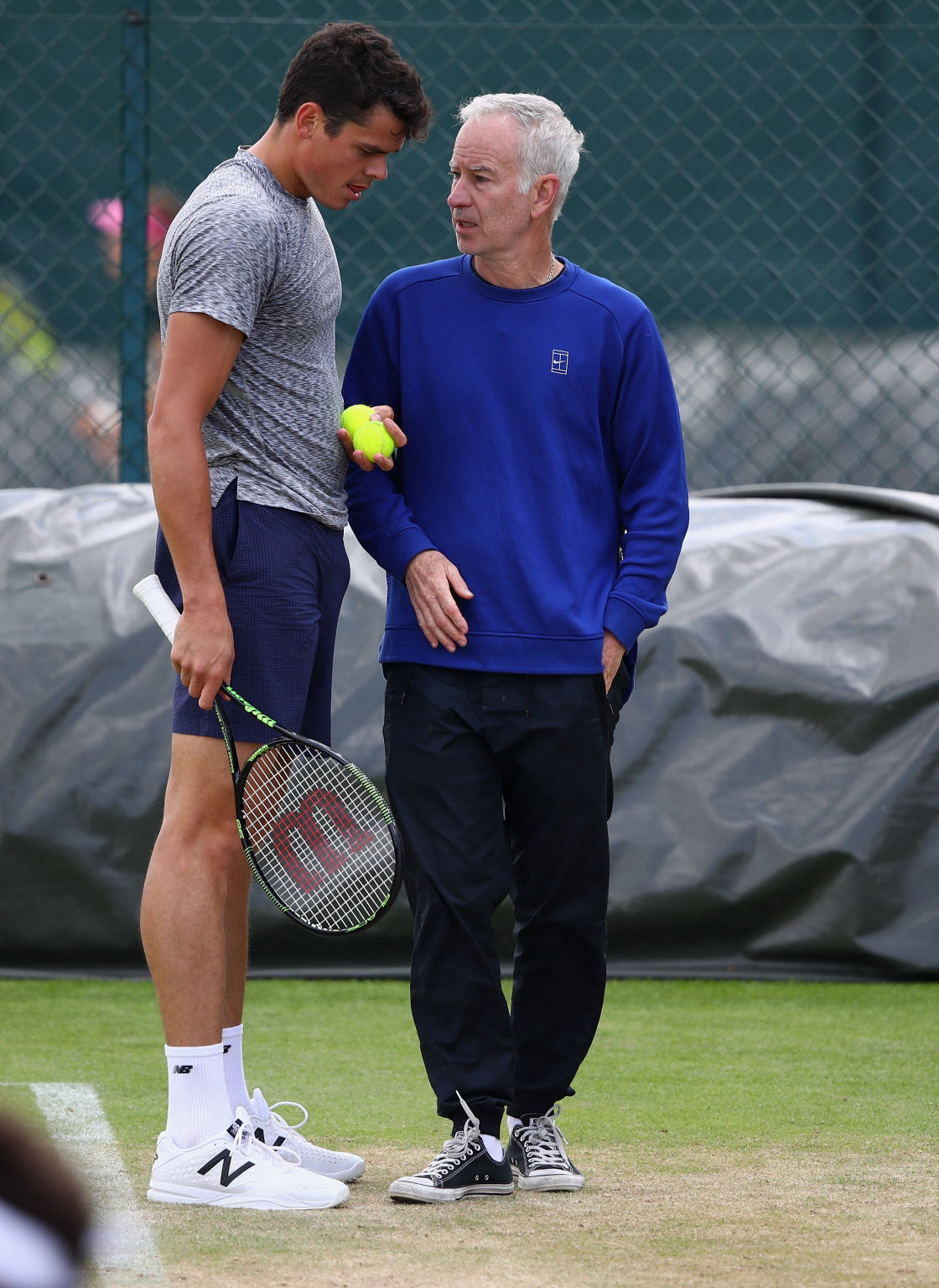 John McEnroe betreut Milos Raonic während der Rasensaison.