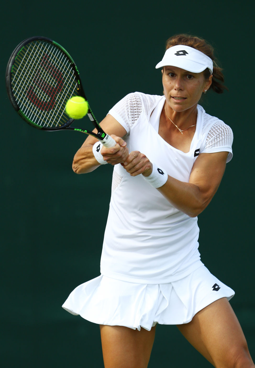 LONDON, ENGLAND - JUNE 27:  Varvara Lepchenko of The United States plays a forehand shot during the Men's Singles first round match against Teliana Pereira of Brazil on day one of the Wimbledon Lawn Tennis Championships at the All England Lawn Tennis and Croquet Club on June 27th, 2016 in London, England.  (Photo by Julian Finney/Getty Images)