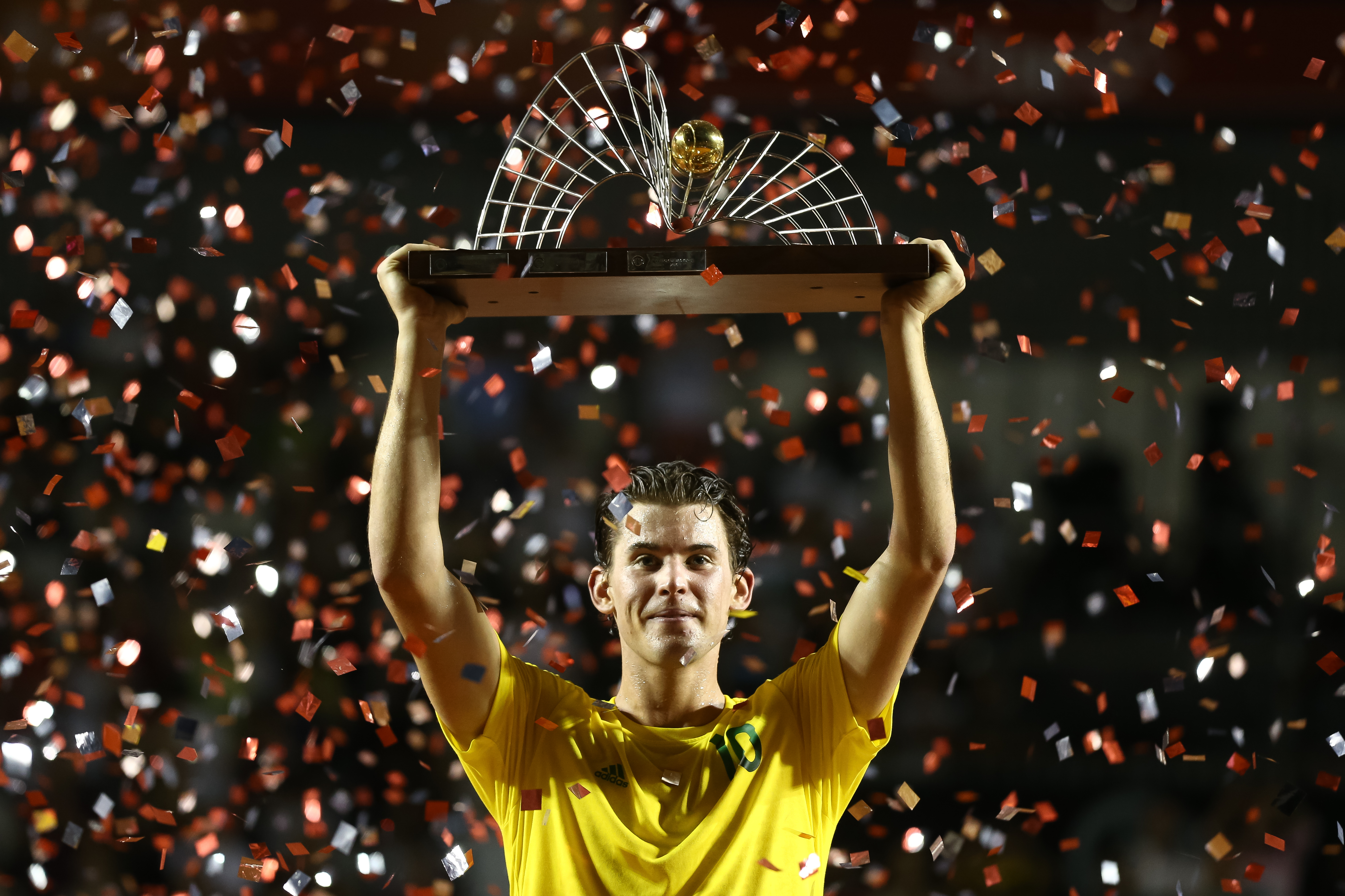 RIO DE JANEIRO, BRAZIL - FEBRUARY 26: Dominic Thiem of Austria raises his trophy after defeating Pablo Carreno Busta of Spain during the Final of the ATP Rio Open 2017 at Jockey Club Brasileiro on February 26, 2017 in Rio de Janeiro, Brazil. (Photo by Buda Mendes/Getty Images)