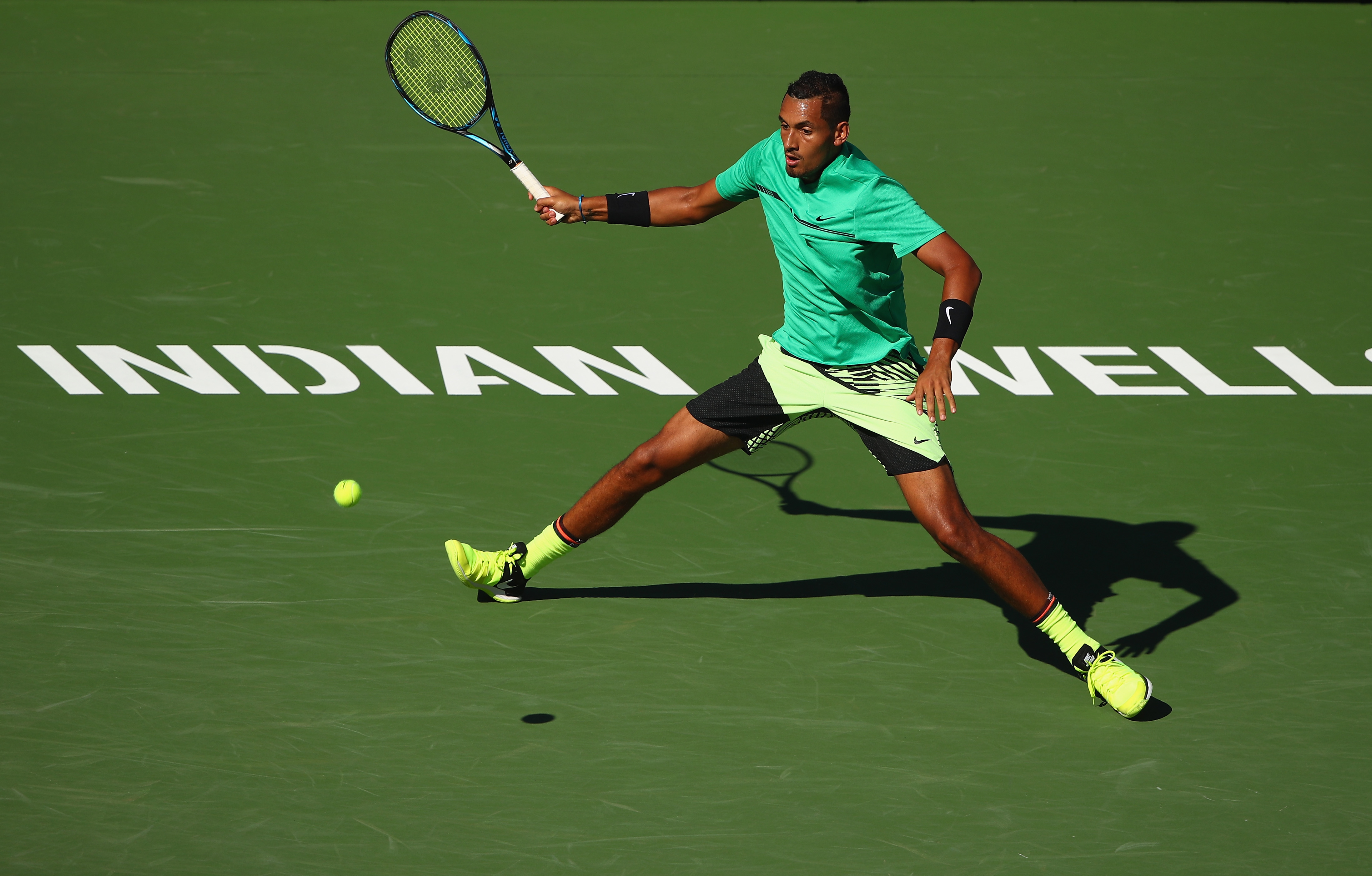 INDIAN WELLS, CA - MARCH 15: Nick Kyrgios of Australia plays a forehand during his straight set victory against Novak Djokovic of Serbia in their fourth round match during day ten of the BNP Paribas Open at Indian Wells Tennis Garden on March 15, 2017 in Indian Wells, California. (Photo by Clive Brunskill/Getty Images)