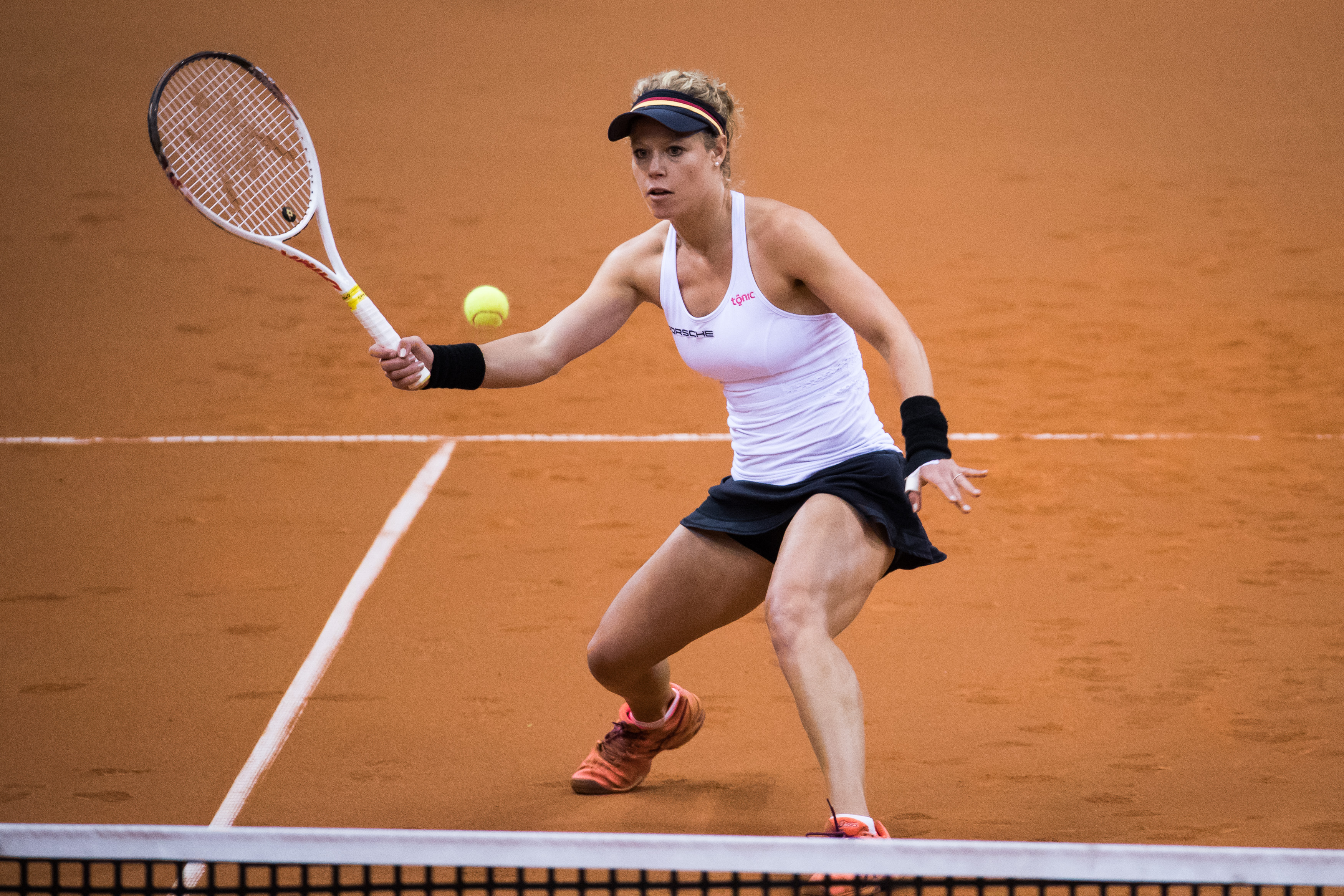 STUTTGART, GERMANY - APRIL 23: Laura Siegemund of Germany in action during the doubles match against Olga Savchuk and Nadiia Kichenok of Ukraine during the FedCup World Group Play-Off match between Germany and Ukraine at Porsche Arena on April 23, 2017 in Stuttgart, Germany. (Photo by Simon Hofmann/Bongarts/Getty Images)