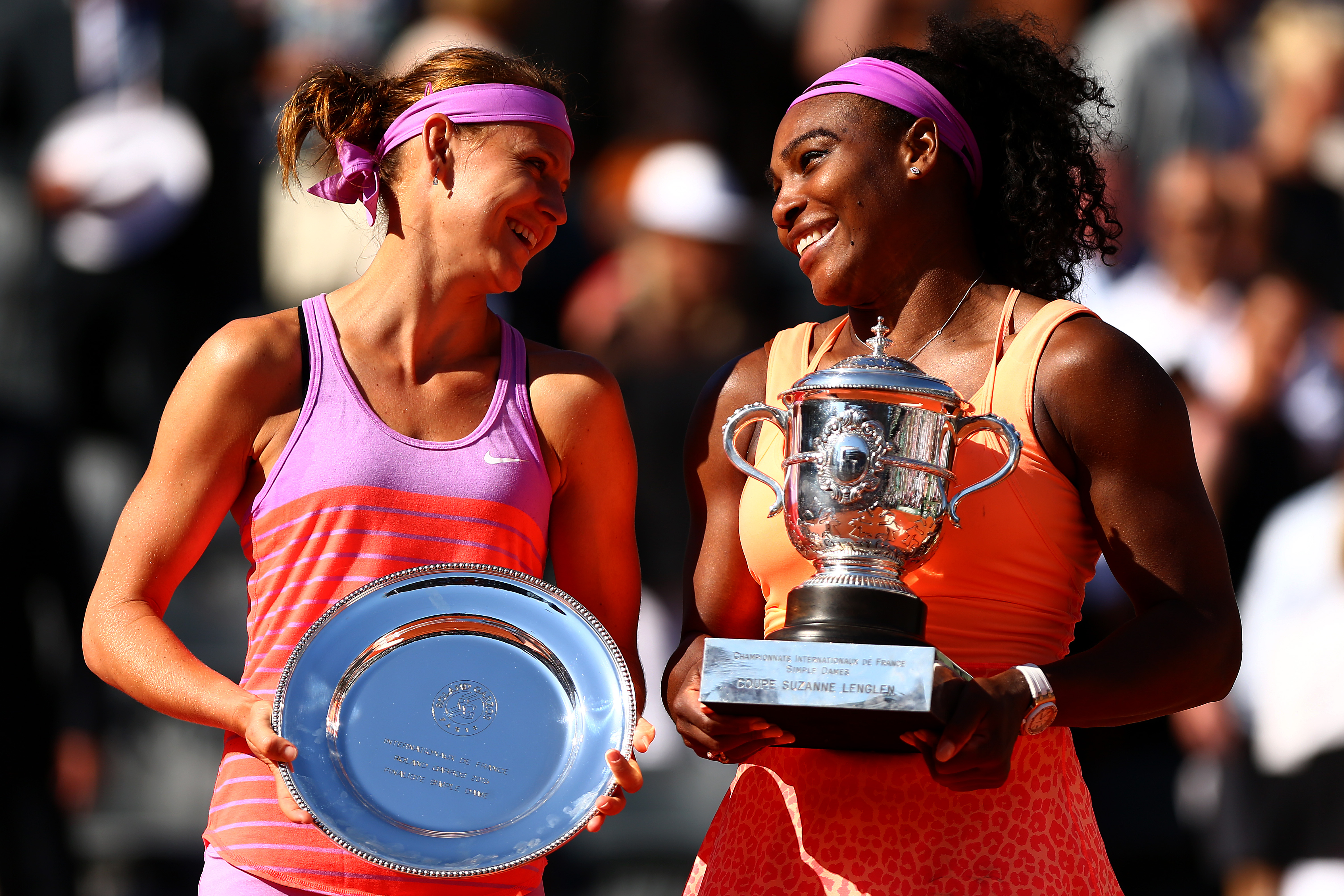 PARIS, FRANCE - JUNE 06: Serena Williams of the United States poses with the Coupe Suzanne Lenglen trophy next to Lucie Safarova of Czech Republic after winning their Women's Singles Final on day fourteen of the 2015 French Open at Roland Garros on June 6, 2015 in Paris, France. (Photo by Dan Istitene/Getty Images)