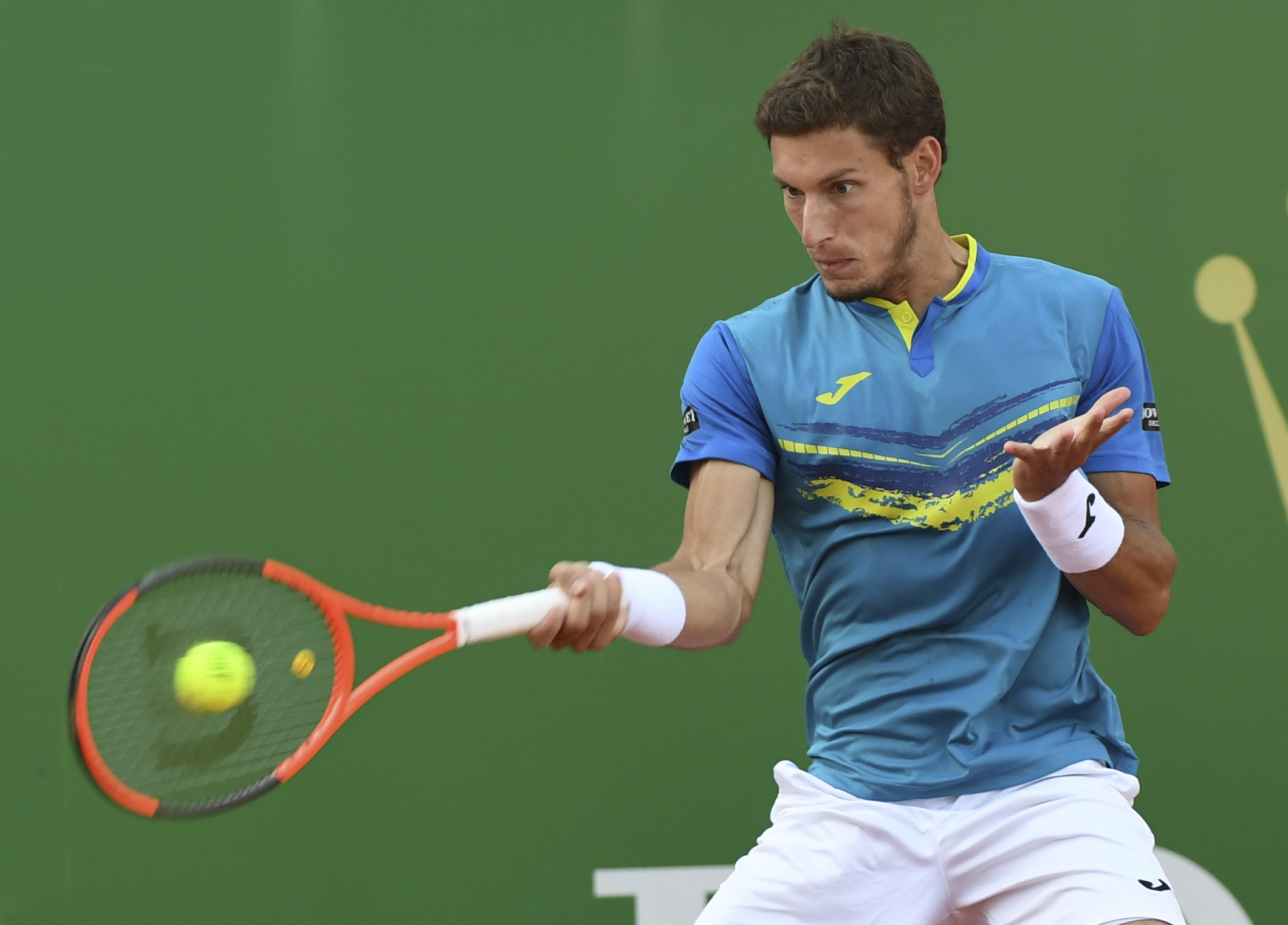 Spain's Pablo Carreno Busta returns the ball to Serbia's Novak Djokovic during the Monte-Carlo ATP Masters Series tennis tournament on April 20, 2017 in Monaco. / AFP PHOTO / Yann COATSALIOU (Photo credit should read YANN COATSALIOU/AFP/Getty Images)