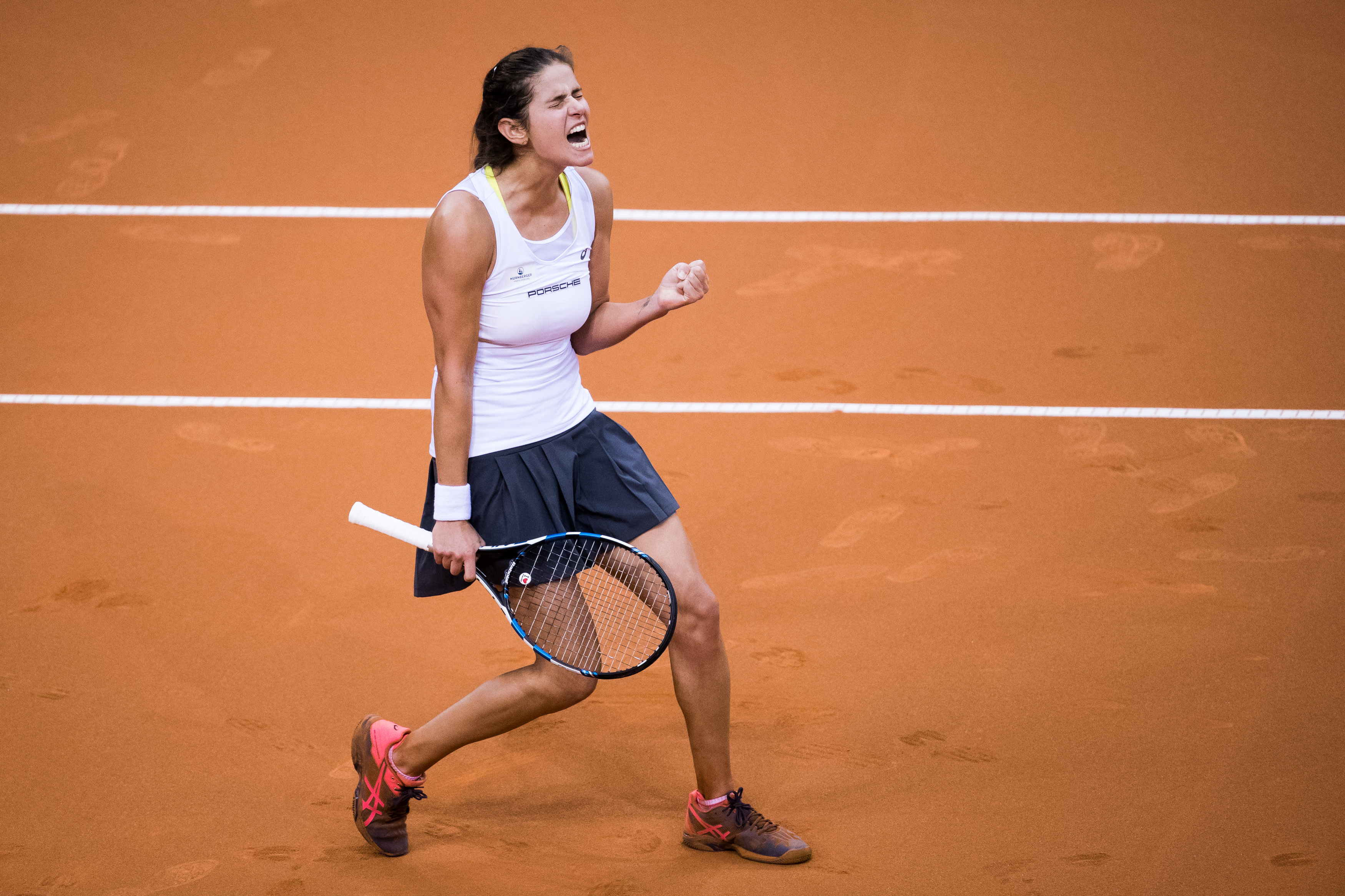 STUTTGART, GERMANY - APRIL 23: Julia Goerges of Germany celebrates victory against Lesia Tsurenko of Ukraine during the FedCup World Group Play-Off match between Germany and Ukraine at Porsche Arena on April 23, 2017 in Stuttgart, Germany. (Photo by Simon Hofmann/Bongarts/Getty Images)