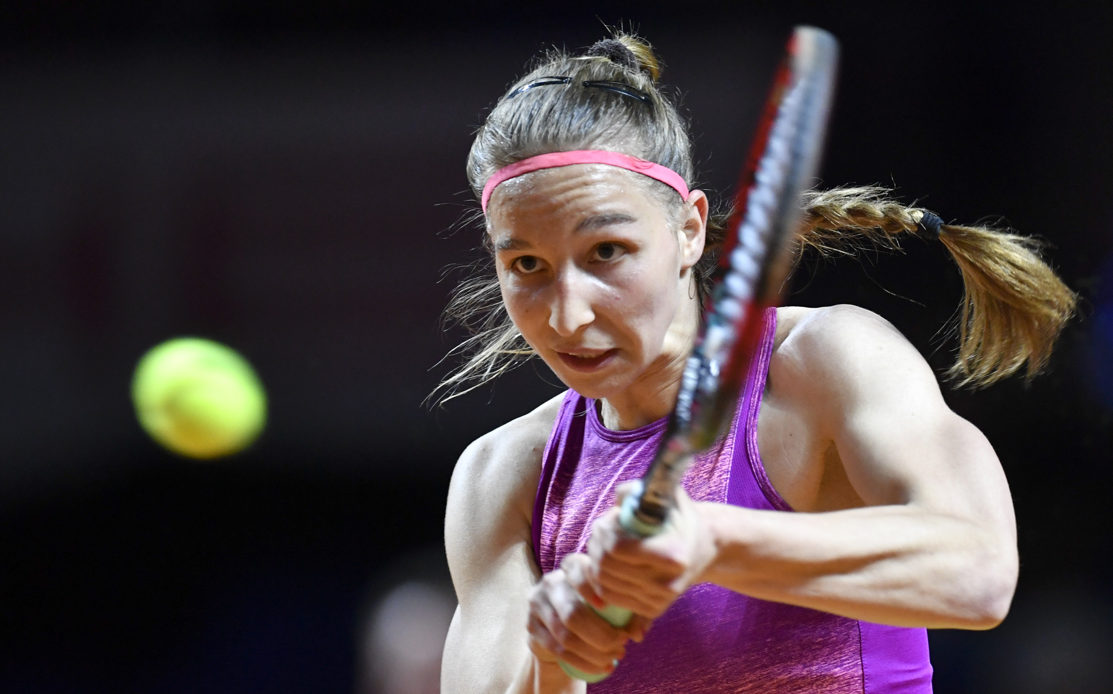 Germany's Tamara Korpatsch returns the ball to Spain's Carla Suarez Navarro during their match at the WTA Porsche Tennis Grand Prix in Stuttgart, southwestern Germany, on April 26, 2017. / AFP PHOTO / THOMAS KIENZLE (Photo credit should read THOMAS KIENZLE/AFP/Getty Images)