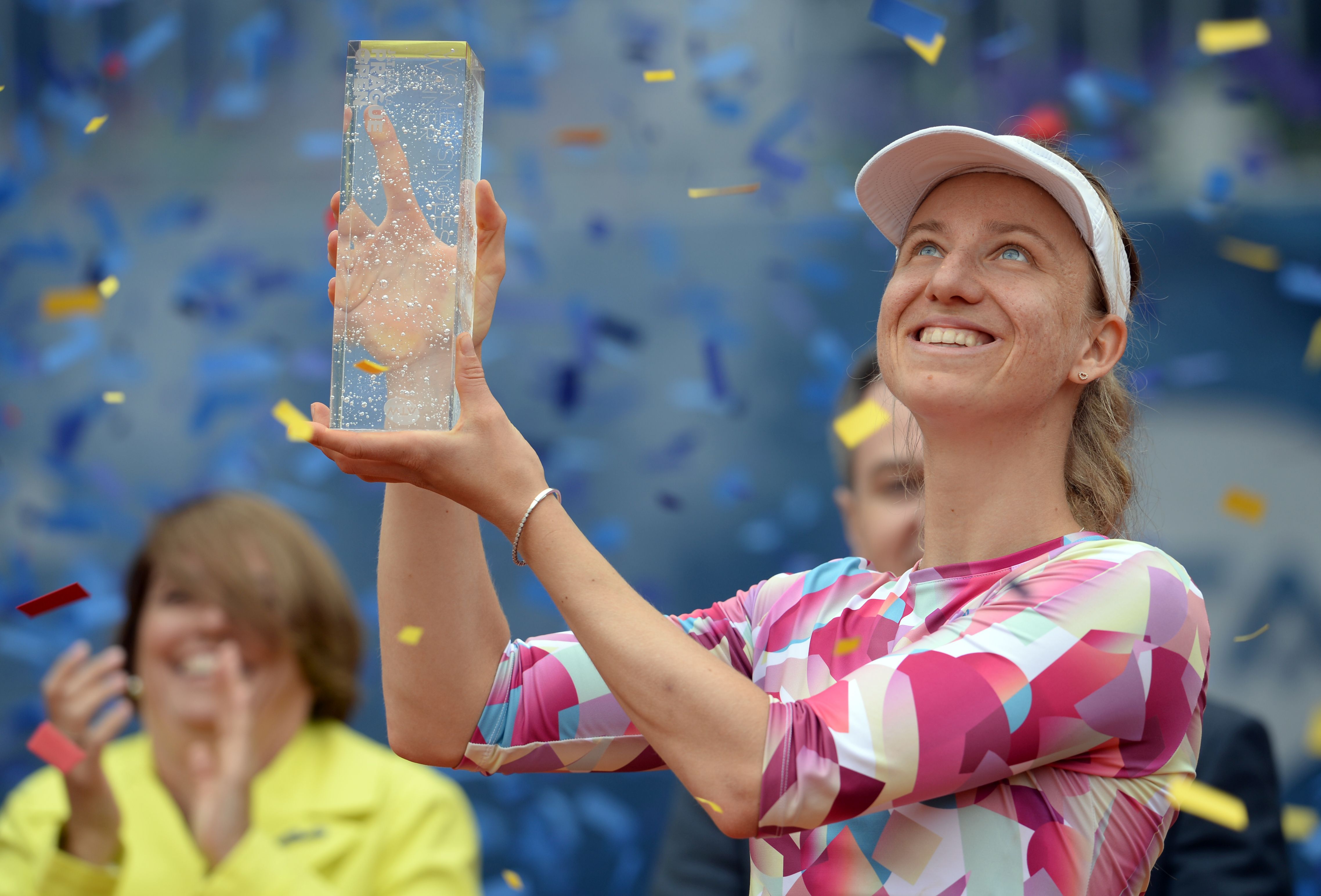 German Mona Barthel poses with the trophy after winning over Czech's Kristyna Pliskova during their final tennis match at the Prague Open on May 6, 2017 in Prague. / AFP PHOTO / Michal Cizek (Photo credit should read MICHAL CIZEK/AFP/Getty Images)