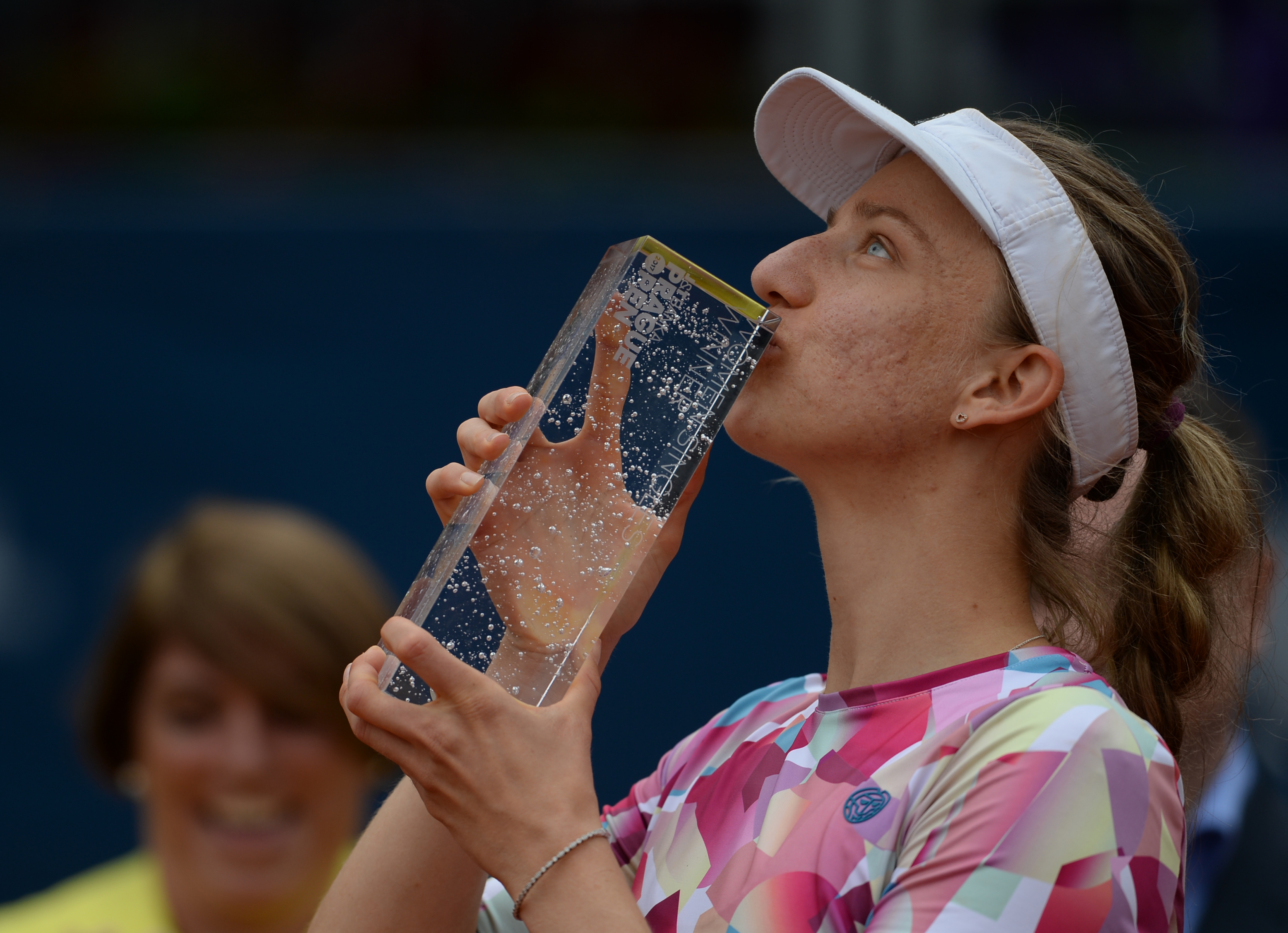 German Mona Barthel kisses the trophy after winning over Czech's Kristyna Pliskova during their final tennis match at the Prague Open on May 6, 2017 in Prague. / AFP PHOTO / Michal Cizek (Photo credit should read MICHAL CIZEK/AFP/Getty Images)