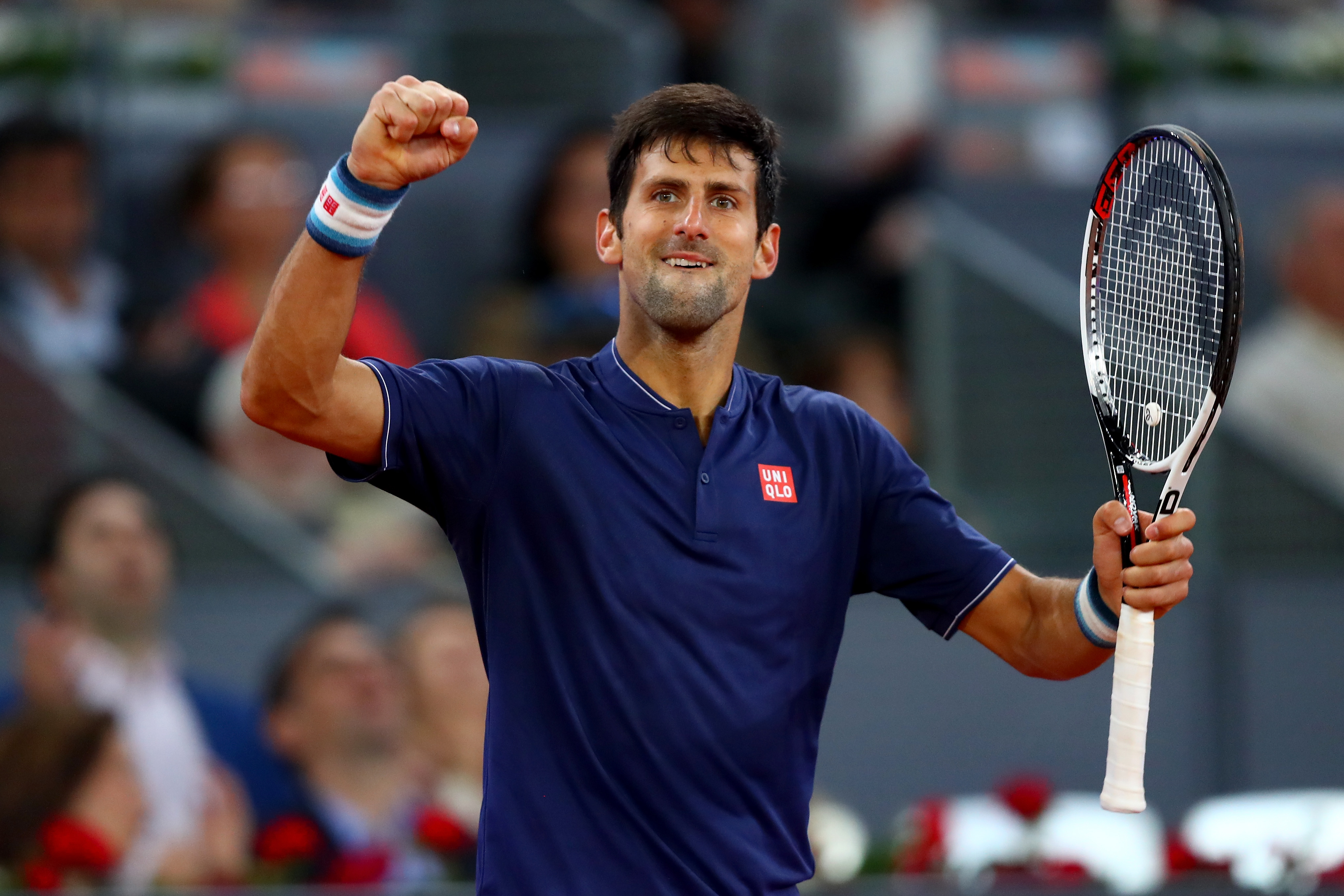 MADRID, SPAIN - MAY 11: Novak Djokovic of Serbia celebrates his victory over Feliciano Lopez of Spain on day six of the Mutua Madrid Open tennis at La Caja Magica on May 11, 2017 in Madrid, Spain. (Photo by Clive Rose/Getty Images)