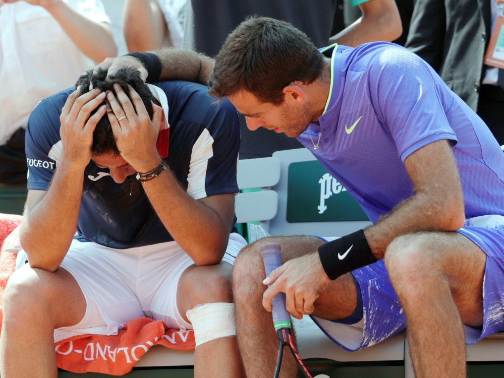 Del Potro (r.) tröstet seinen Gegner Almagro (l.)