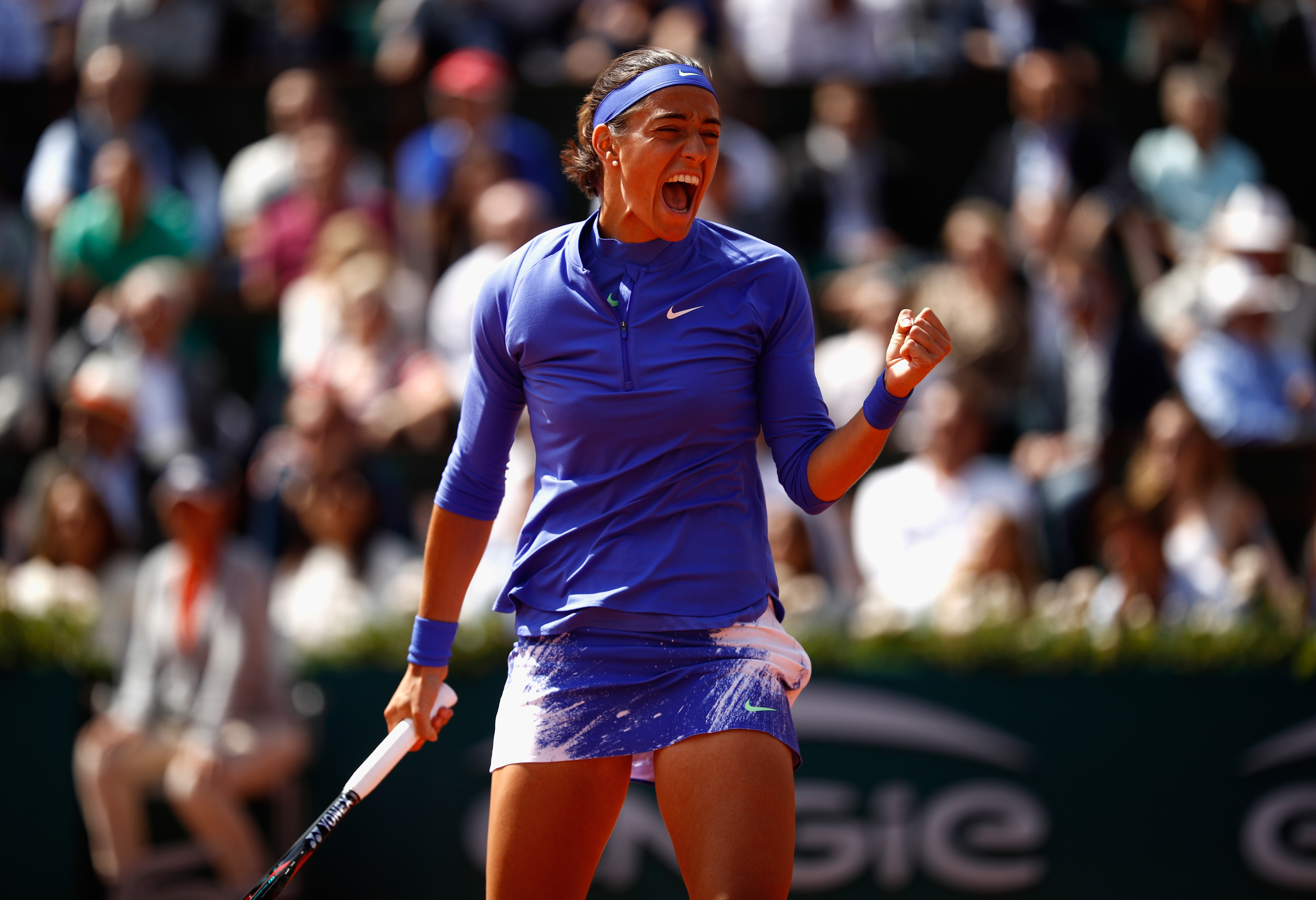 PARIS, FRANCE - JUNE 07: Caroline Garcia of France celebrates during ladies singles quarter finals match against Karolina Pliskova of The Czech Republic on day eleven of the 2017 French Open at Roland Garros on June 7, 2017 in Paris, France. (Photo by Adam Pretty/Getty Images)