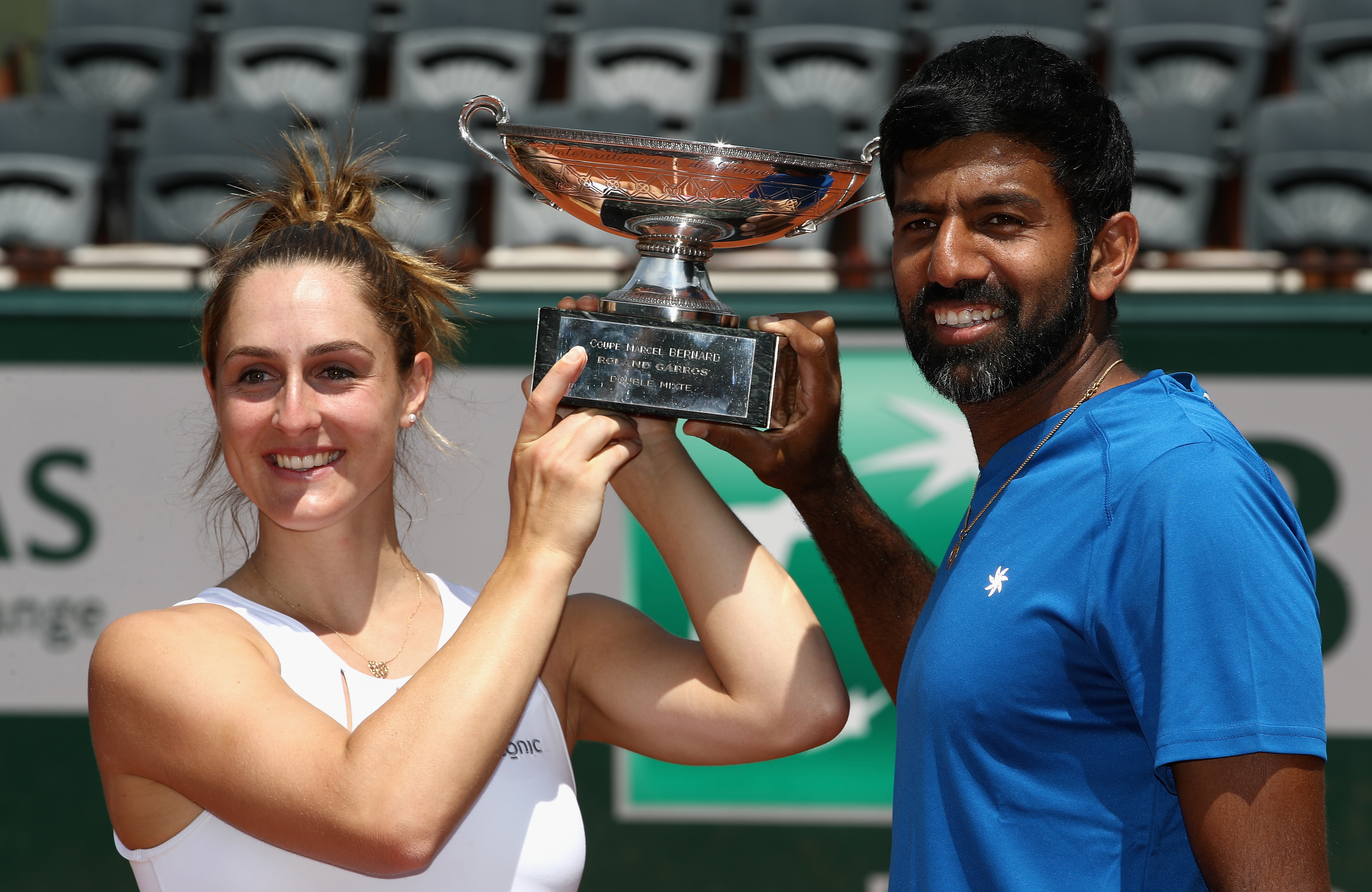 PARIS, FRANCE - JUNE 08:  Gabriela Dabrowski of Canada and Rohan Bopanna of India celebrate with the trophy following victory in the mixed doubles final against Anna-Lena Groenefeld of Germany and Robert Farah of Columbia on day twelve of the 2017 French Open at Roland Garros on June 8, 2017 in Paris, France.  (Photo by Julian Finney/Getty Images)