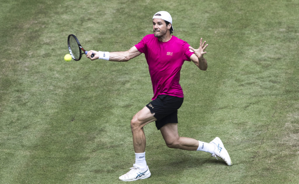 HALLE, GERMANY - JUNE 20: Tommy Haas of Germany plays a forehand during his match against Bernard Tomic of Australia during Day 4 of the Gerry Weber Open 2017 at on June 20, 2017 in Halle, Germany. (Photo by Lars Baron/Bongarts/Getty Images)