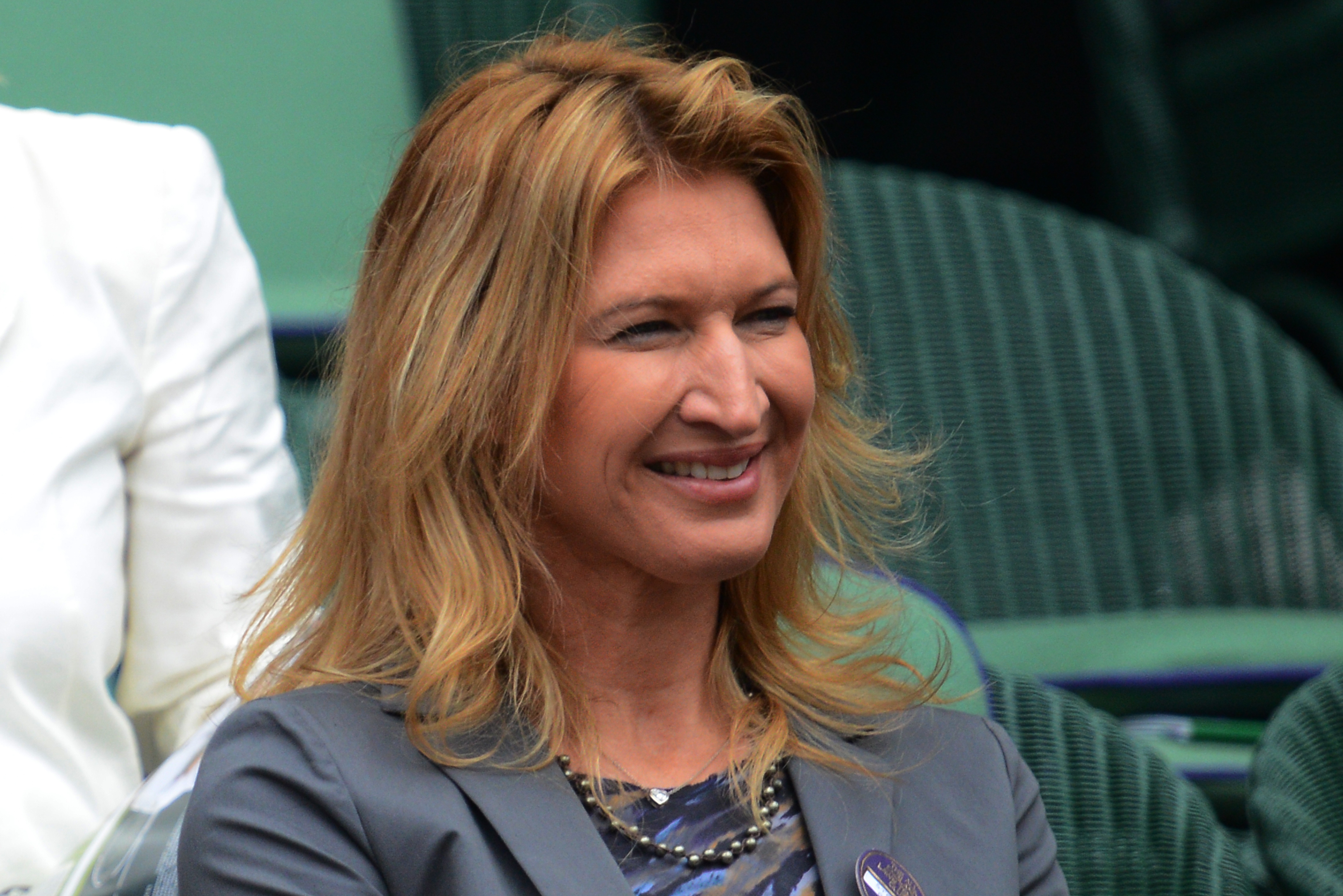 Former German tennis player Steffi Graf in the Royal Box on Centre Court on day nine of the 2012 Wimbledon Championships tennis tournament at the All England Tennis Club in Wimbledon, southwest London, on July 4, 2012. AFP PHOTO / LEON NEAL RESTRICTED TO EDITORIAL USE (Photo credit should read LEON NEAL/AFP/GettyImages)