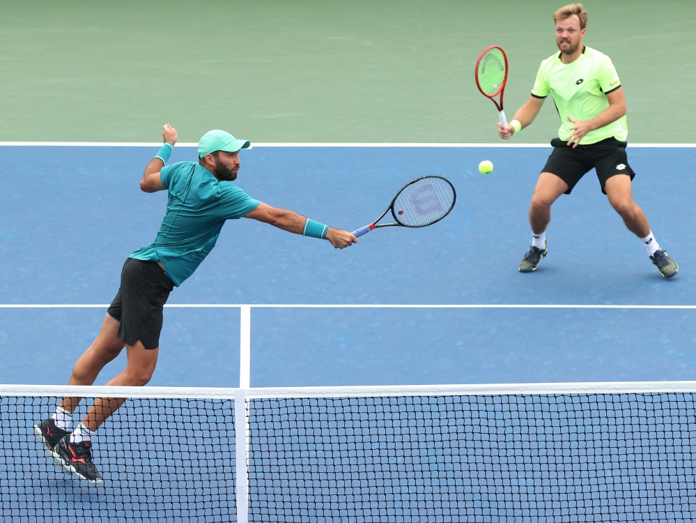 Krawietz (r.) reist mit Tecau nach Turin
