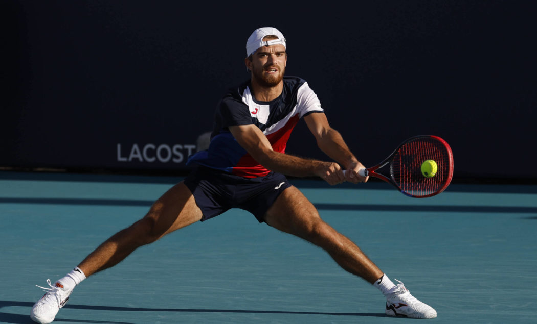 Tennis: Miami Open Mar 24, 2024; Miami Gardens, FL, USA; Tomas Machac (CZE) reaches for a backhand against Andy Murray (