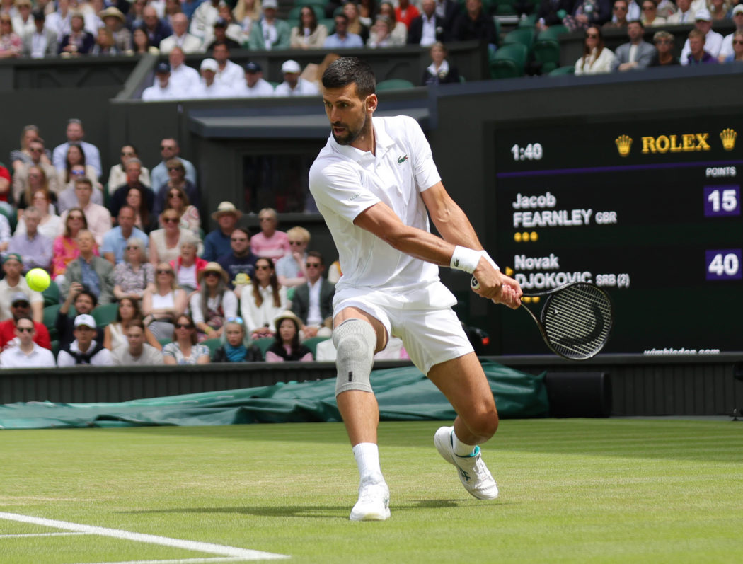 Serbian Novak Djokovic plays a backhand in his second round match against Britain s Jacob Fearnley on day Four of the 20