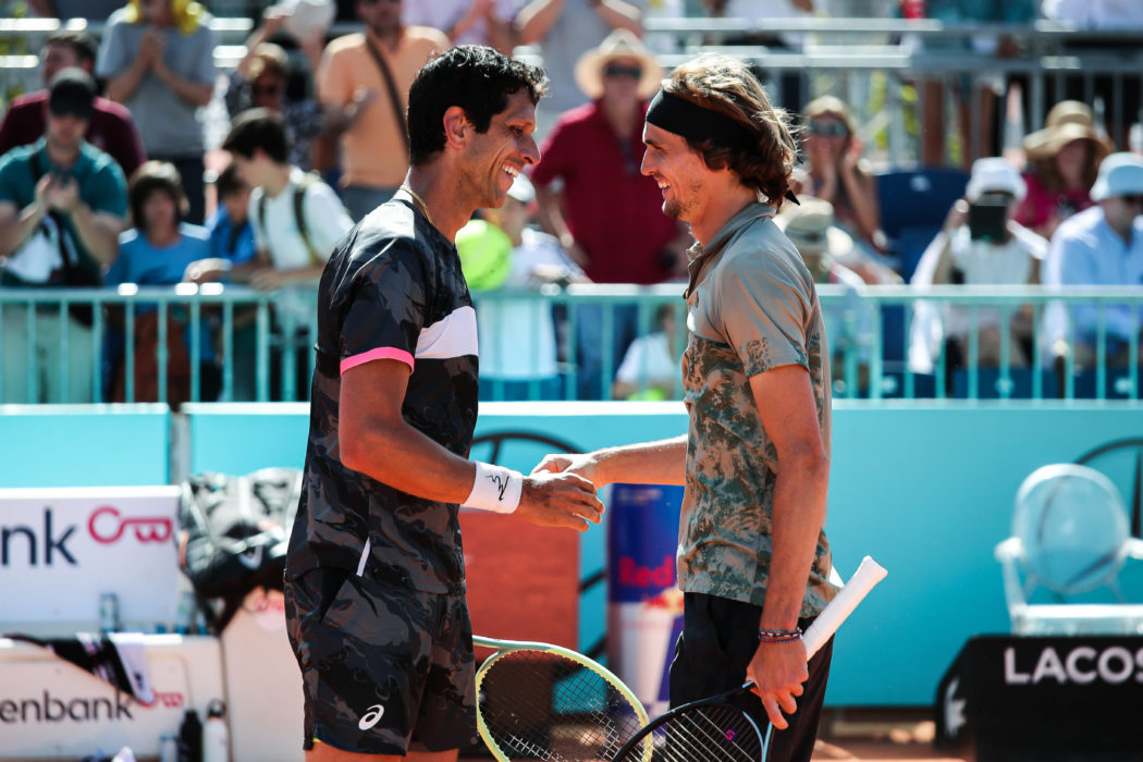 April 27, 2023, MADRID, MADRID, SPAIN: Marcelo Melo of Brazil and Alexander Zverev of Germany celebrate after winning ag