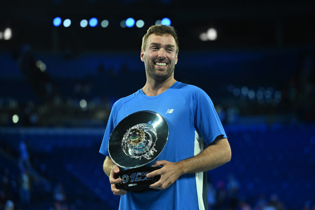 TENNIS AO 1 POINT SLAM, Jordan Smith of New South Wales reacts while holding the trophy after defeating Joanna Garland o